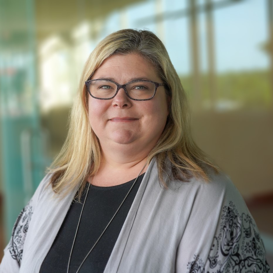 Staff-Photos-8-1 A portrait of Kerri Johnson smiling